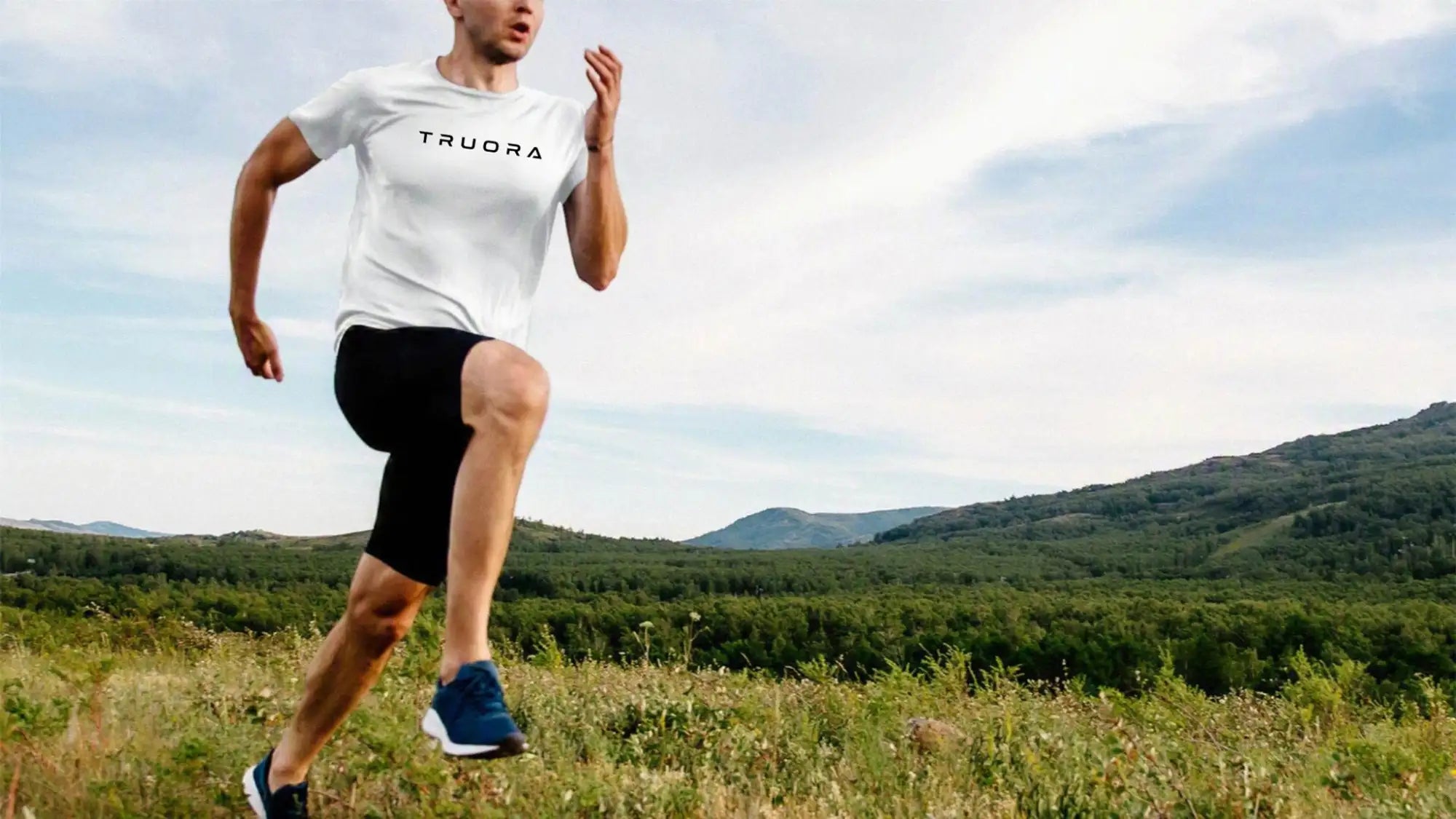 White truora t-shirt with black lettering.